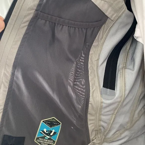 Columbia Titanium Omnitech waterproof jacket (shell) with drawstring hood.